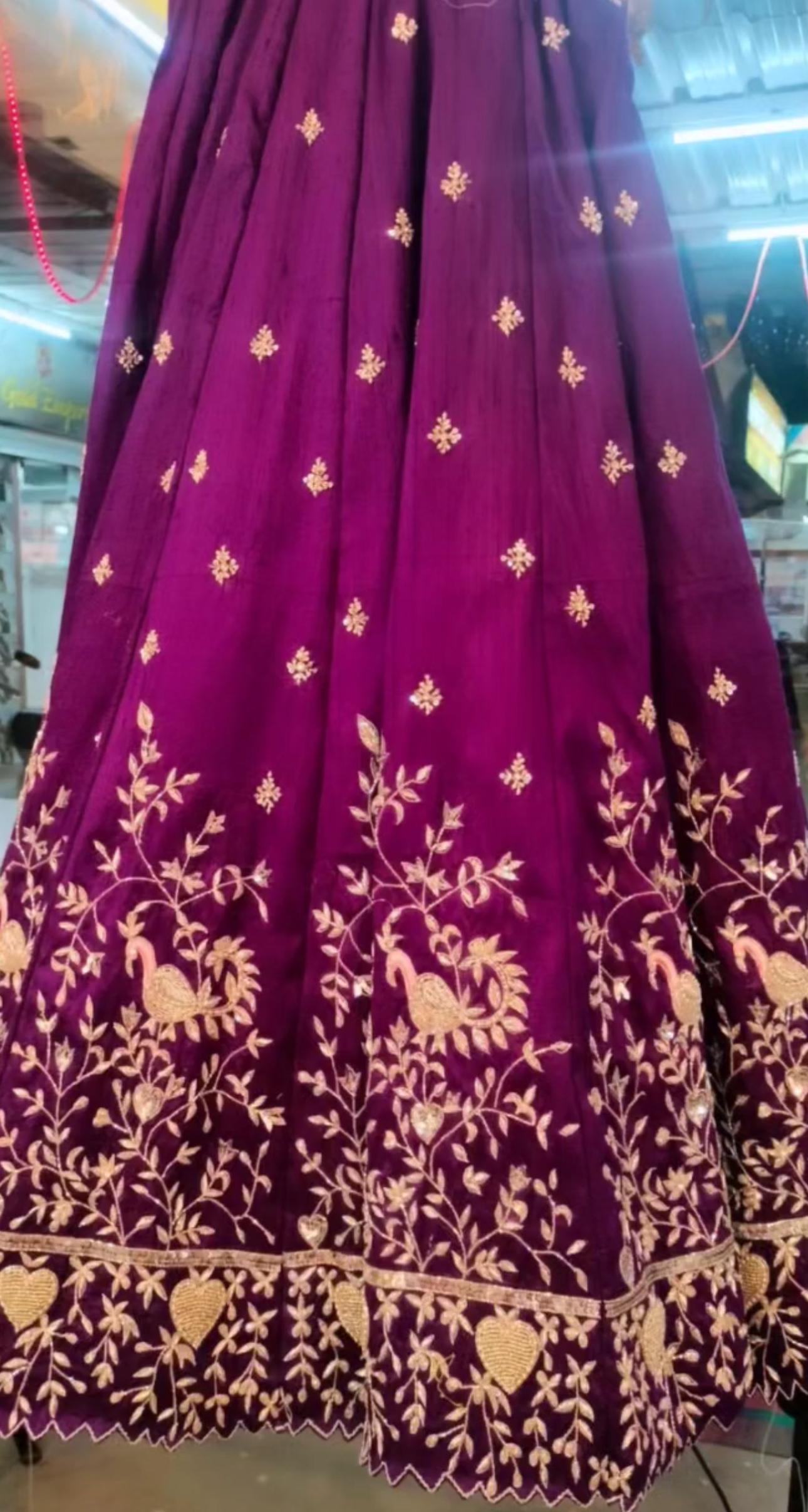 Purple lehenga with gold zari floral embroidery and ornate hem border