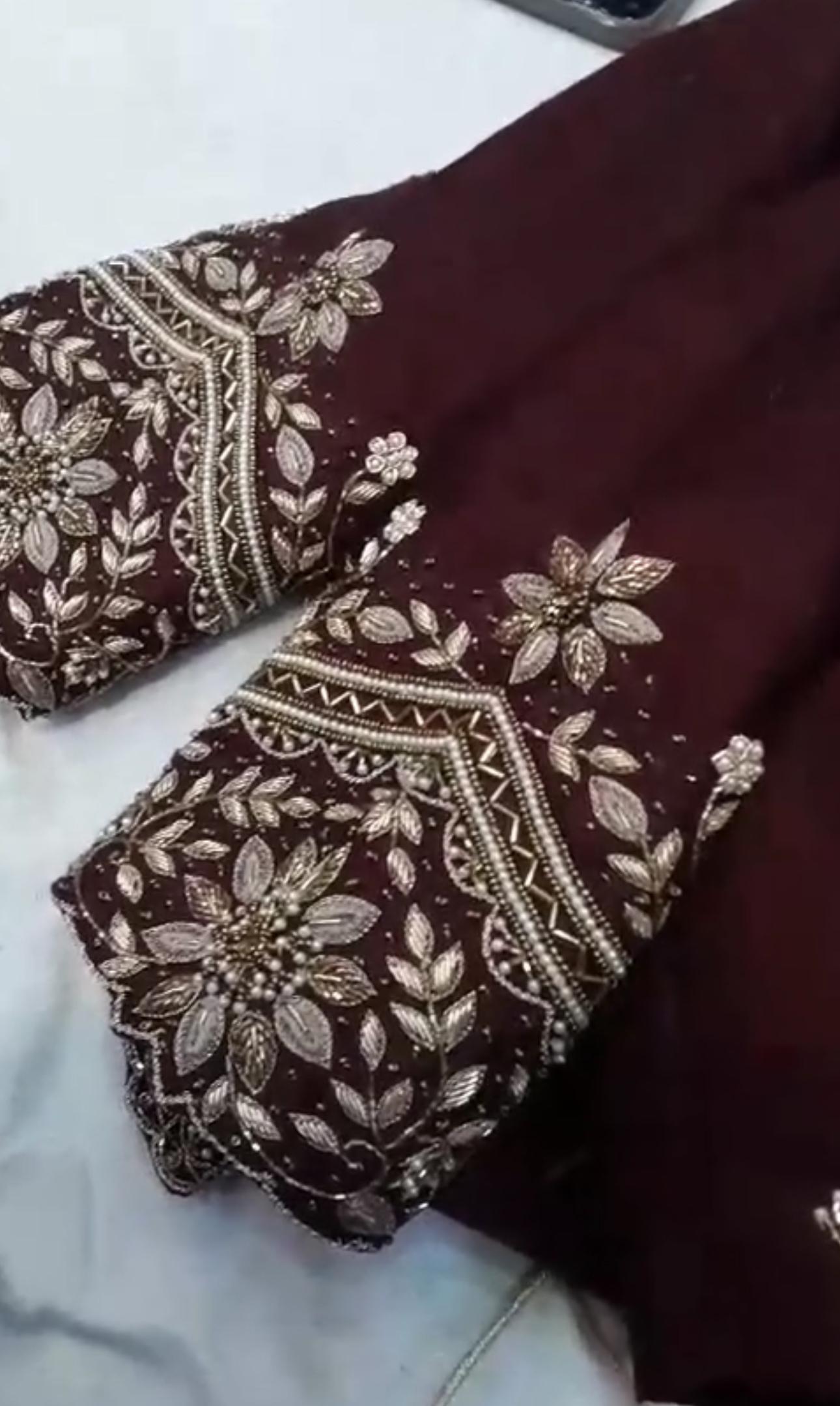 Maroon blouse with dense gold zari floral embroidery work