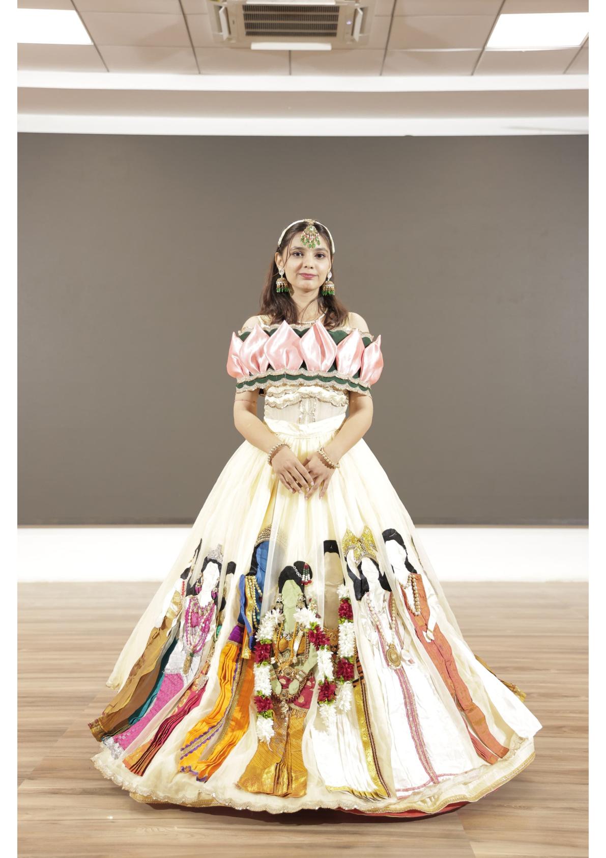 Cream lehenga with colorful silk dupatta panels and floral embellishments