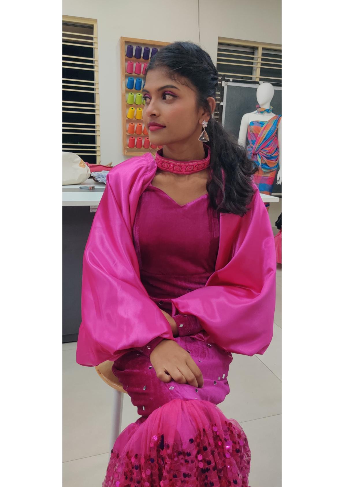 Magenta embellished lehenga with sheer dupatta and ornate choker