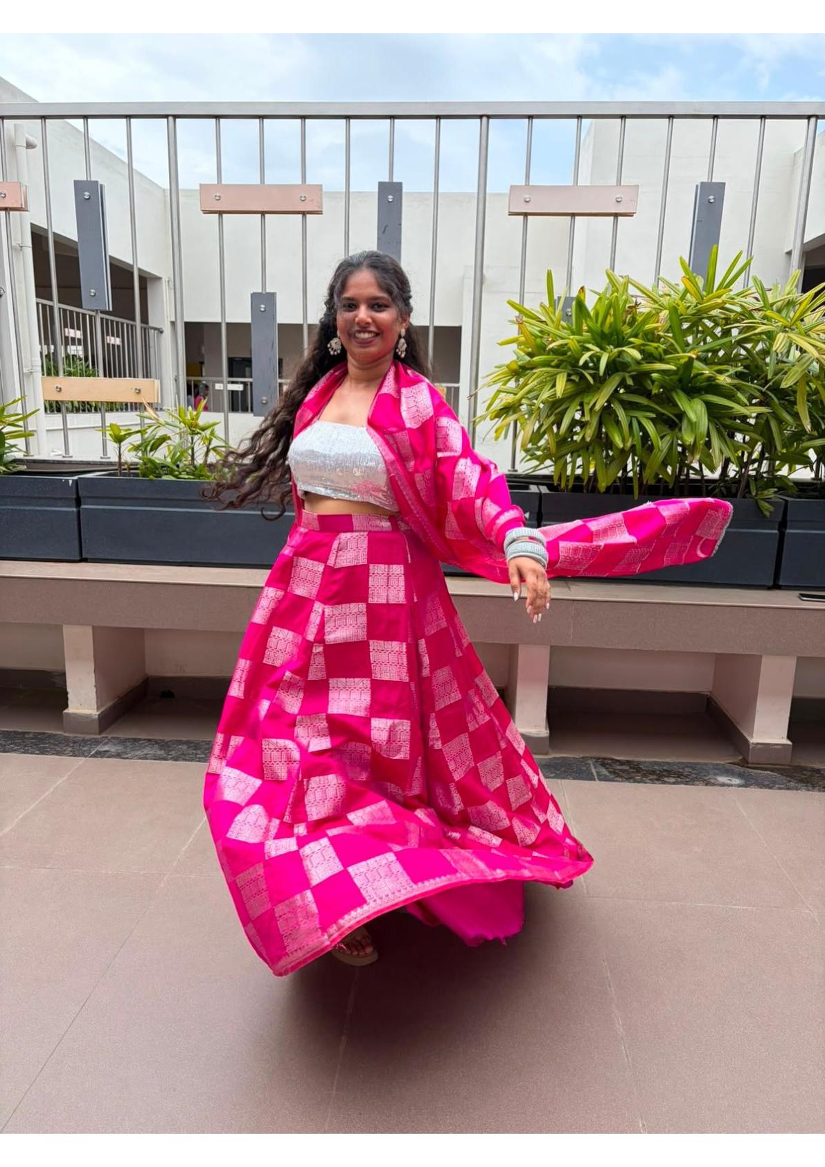 Hot pink checkered lehenga set with matching blazer and crop top
