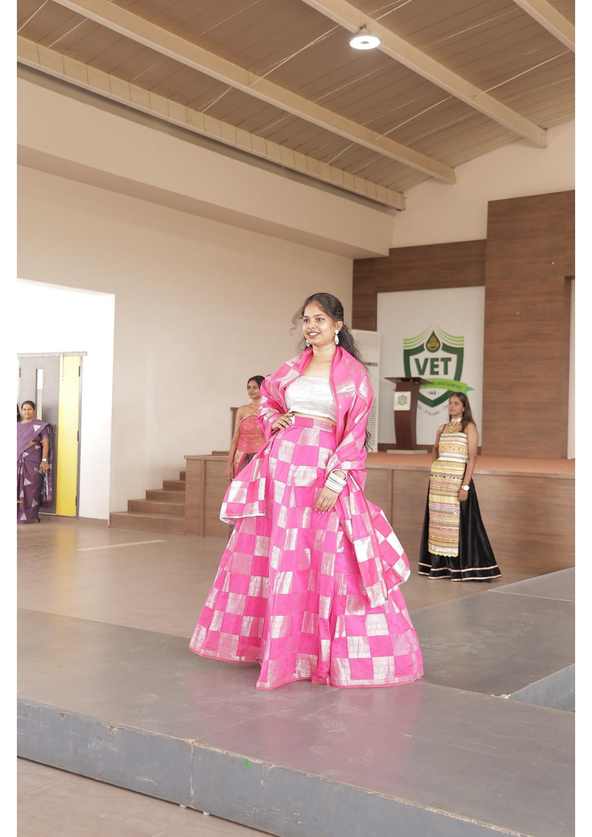 Pink checkered lehenga with white crop top and matching jacket