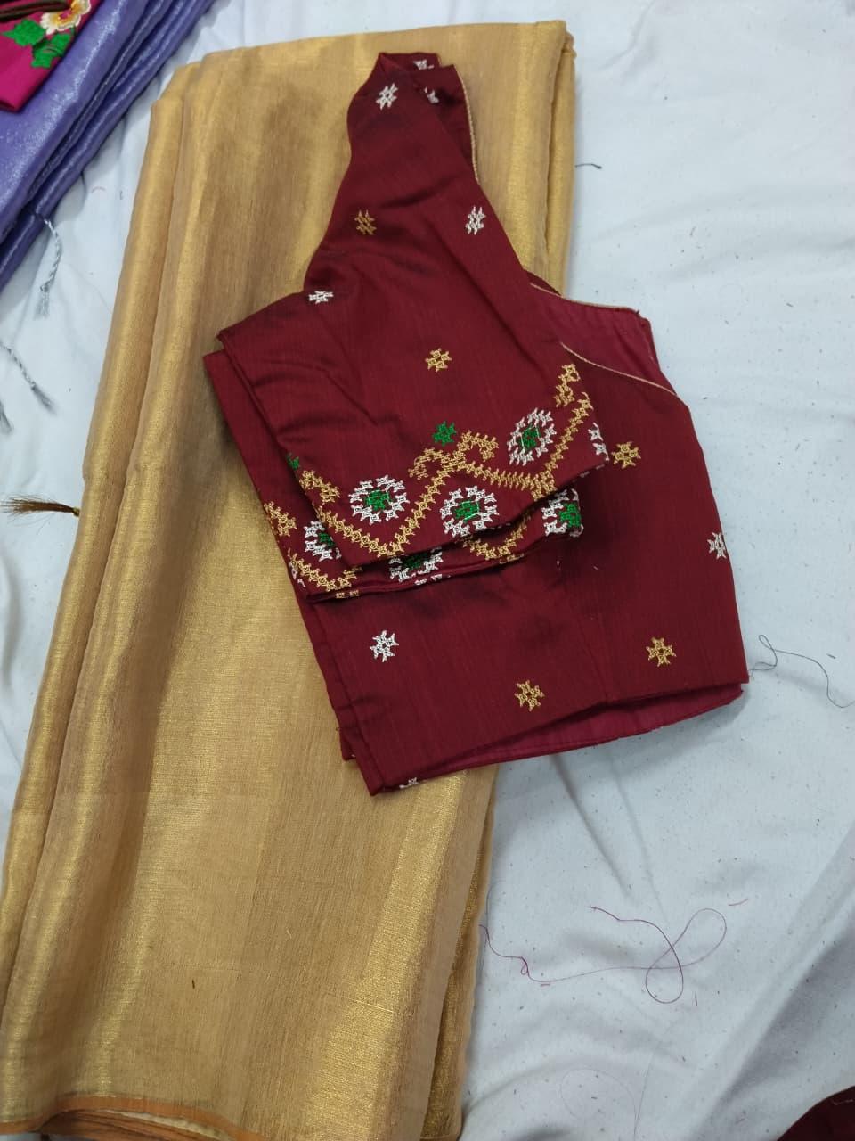 Maroon blouse with gold zari and green sequin embroidery work