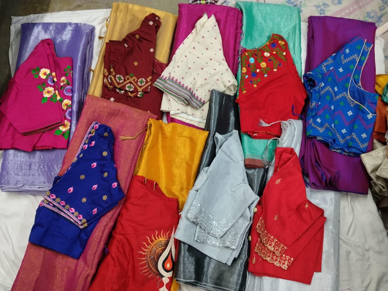 Colorful traditional sarees collection with embroidered blouses and borders