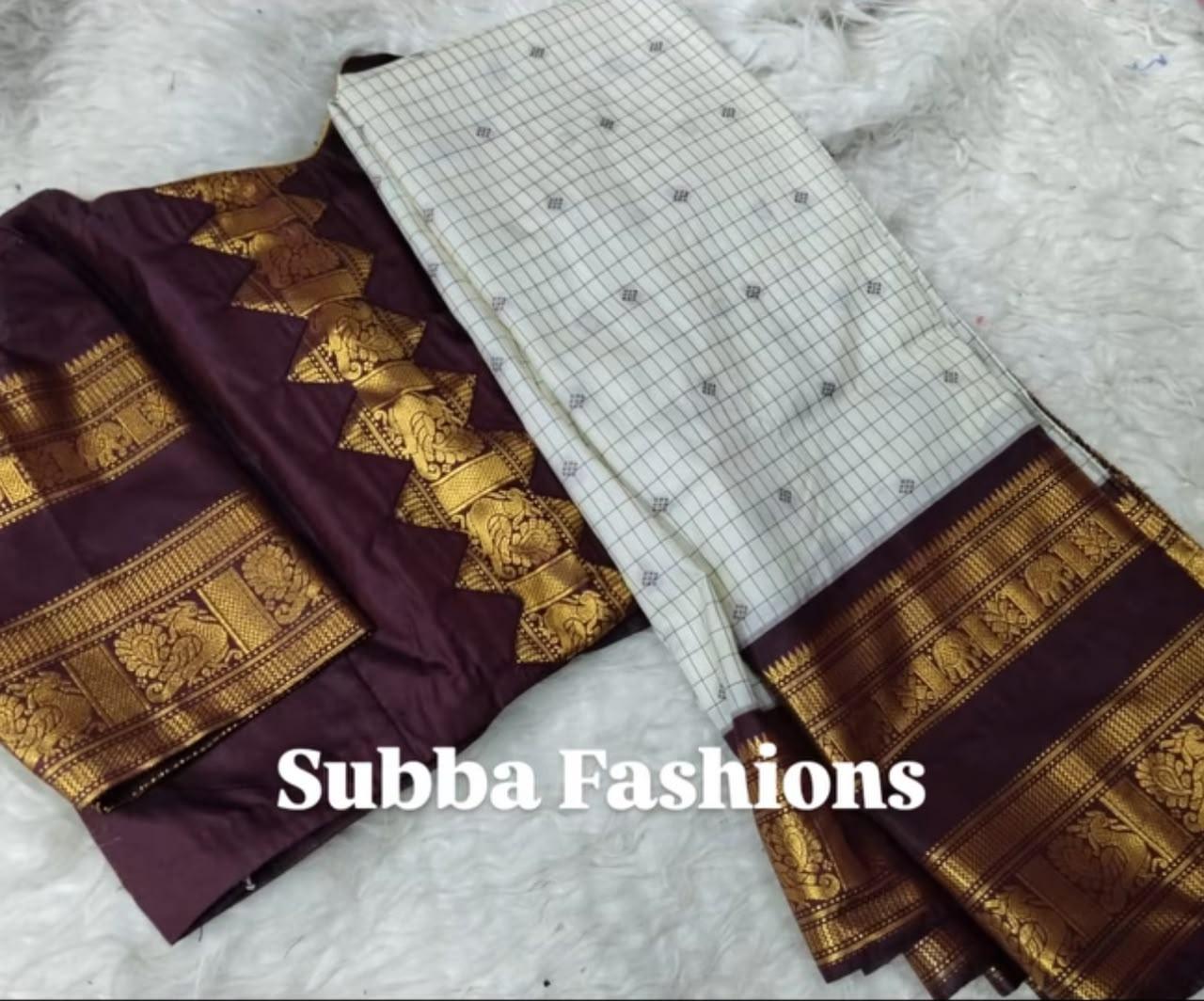 Maroon silk saree with gold zari border and pallu embroidery