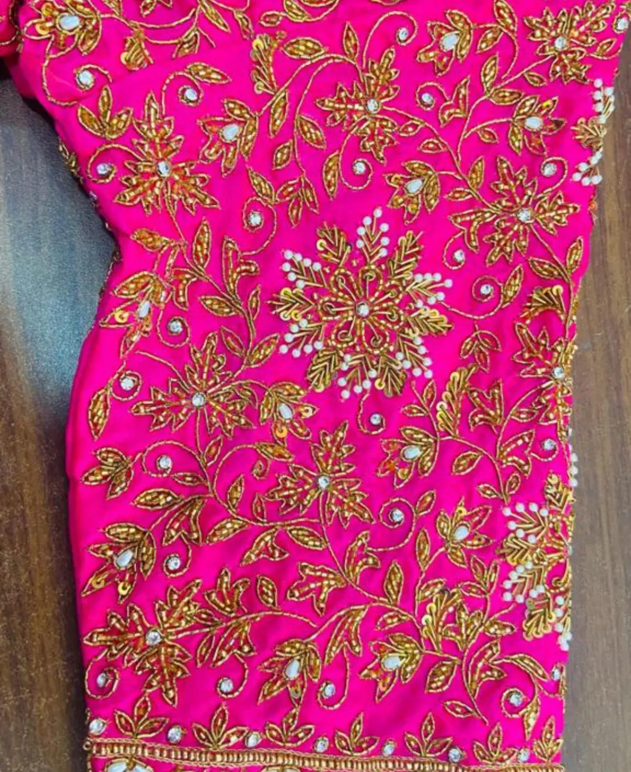 Bright pink blouse with gold zari floral embroidery and stone work