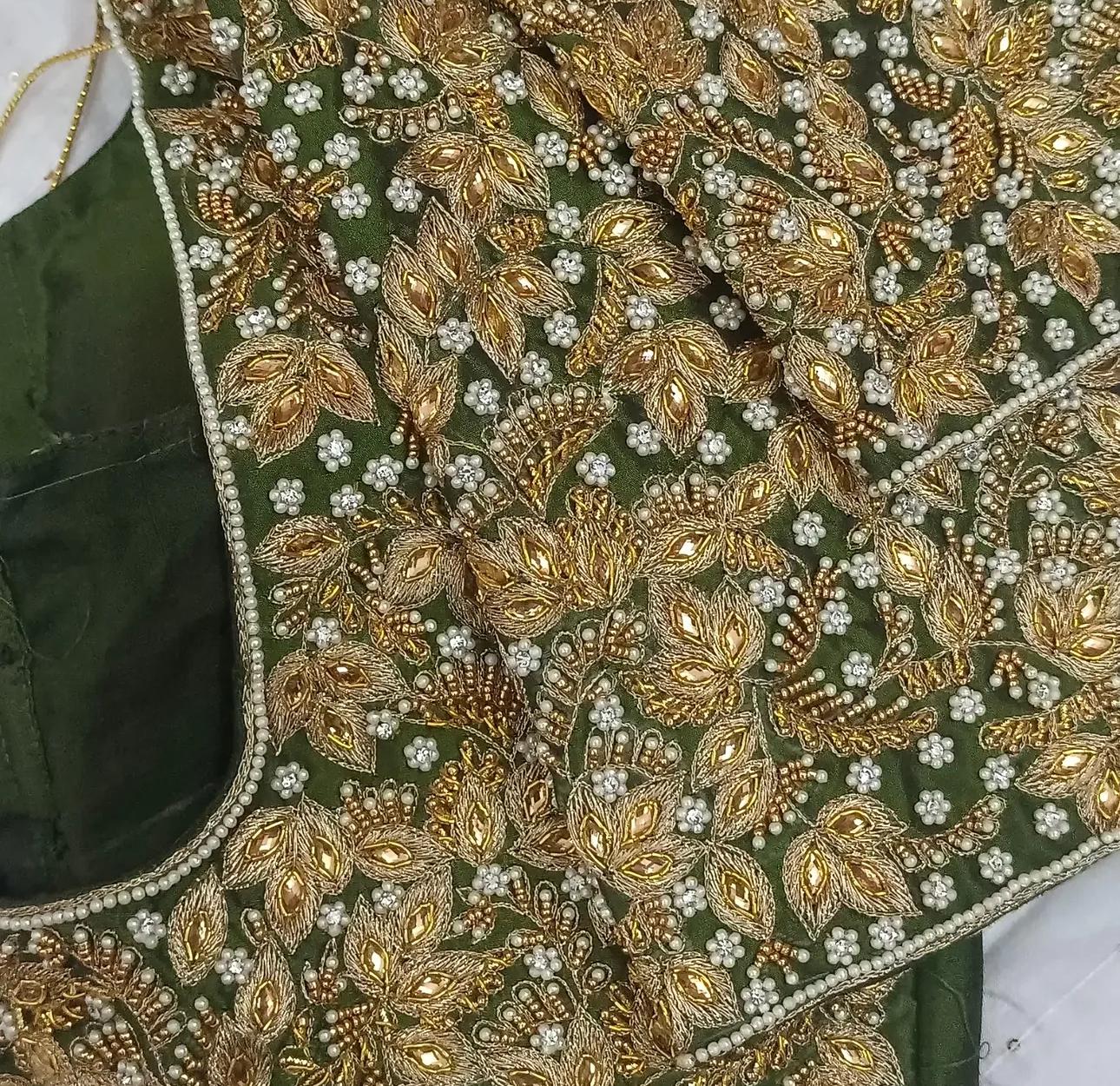 Green blouse with gold zari and pearl embroidery work
