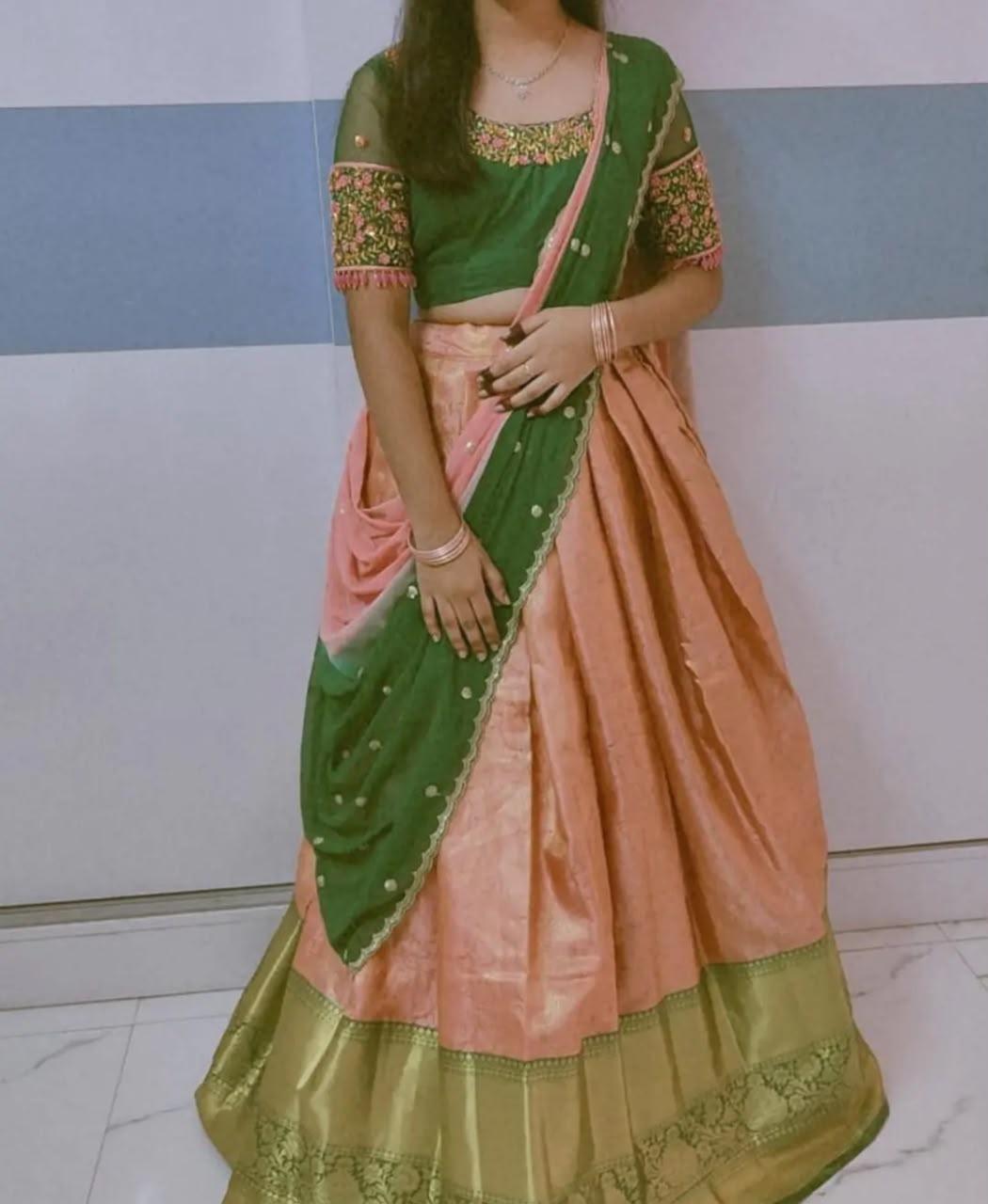 Green and peach half saree with floral embroidered blouse and dupatta