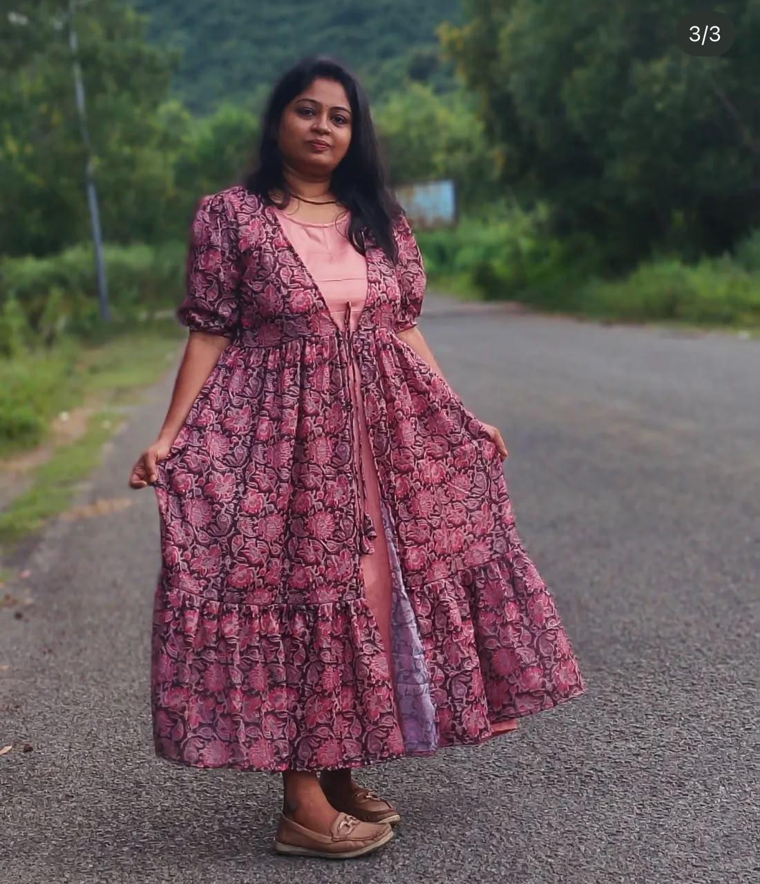 Maroon floral printed maxi dress with puffed sleeves and tiered hem