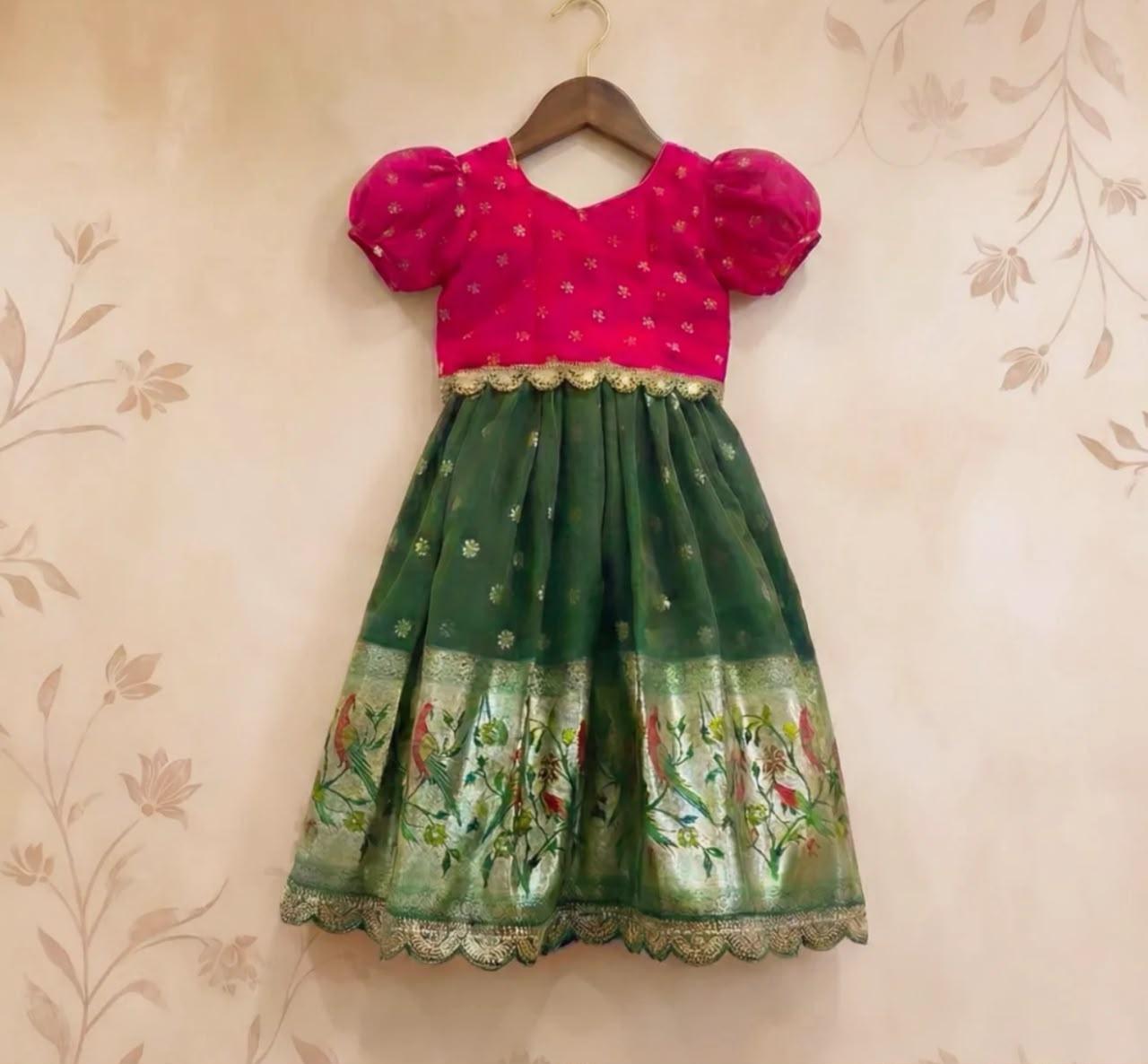 Girls traditional dress with pink velvet top and green silk skirt with floral embroidery
