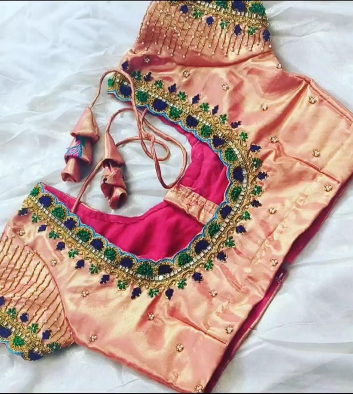 Pink bridal blouse with gold zari and stone embroidery work
