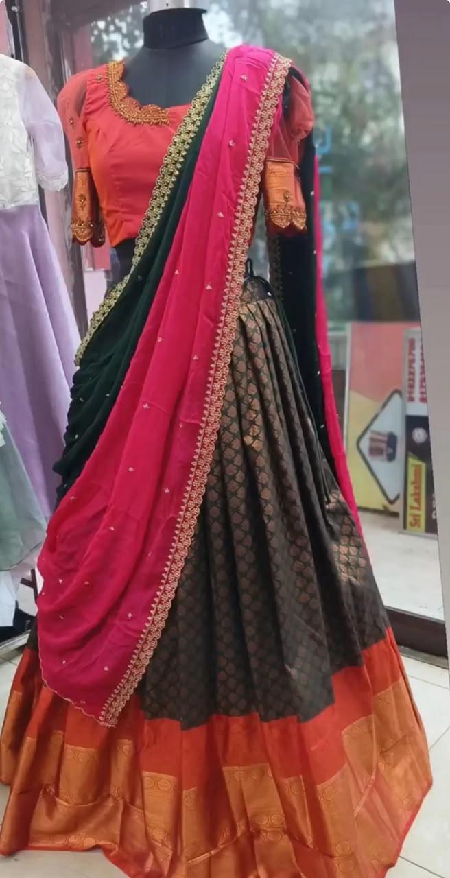 Red and orange lehenga with pink dupatta and gold embroidery