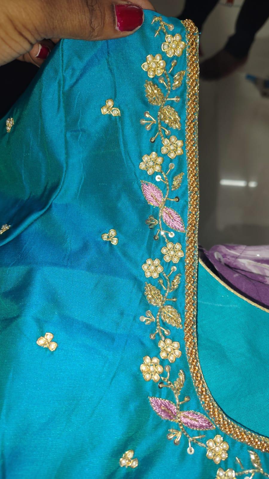 Turquoise silk blouse with gold zari and pearl floral embroidery