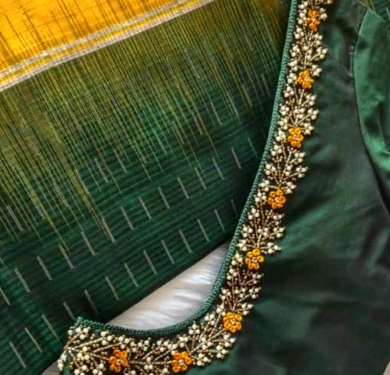 Green saree with yellow border and gold embroidered trim