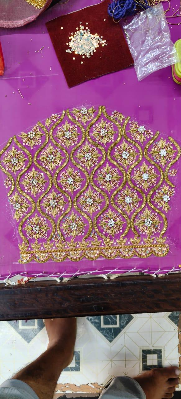 Purple blouse with gold floral maggam work and stone embellishments