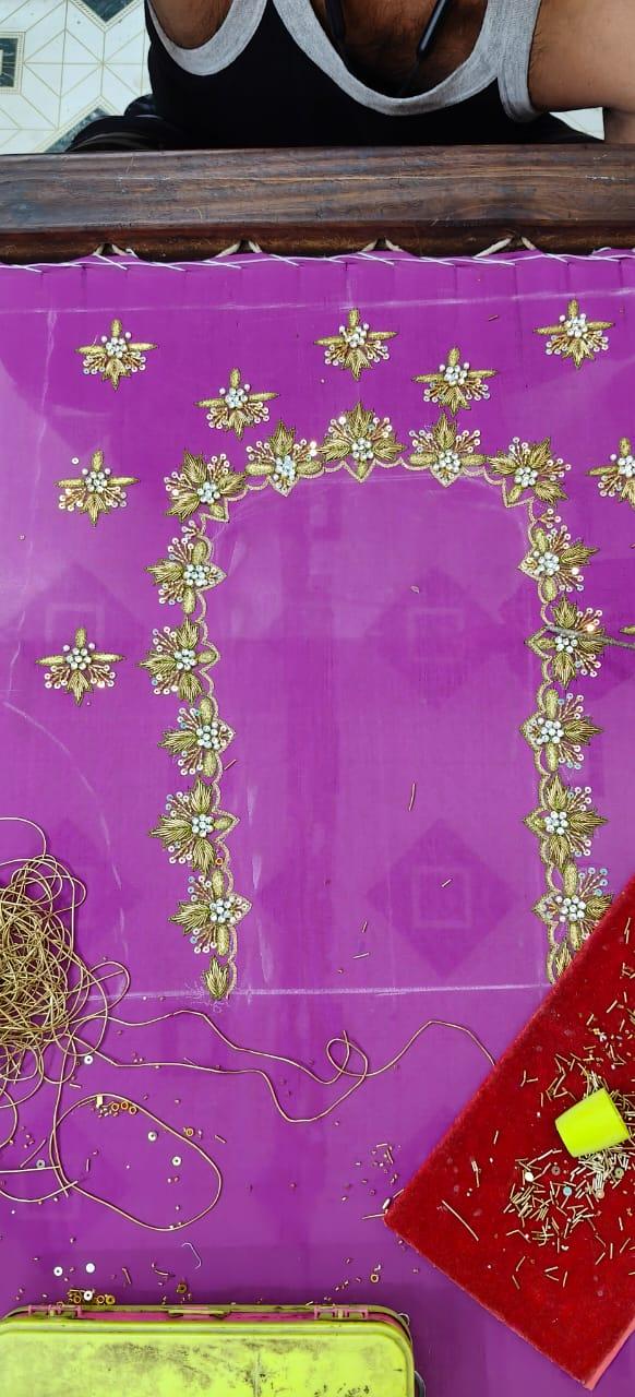 Purple silk saree with gold zari floral maggam work border