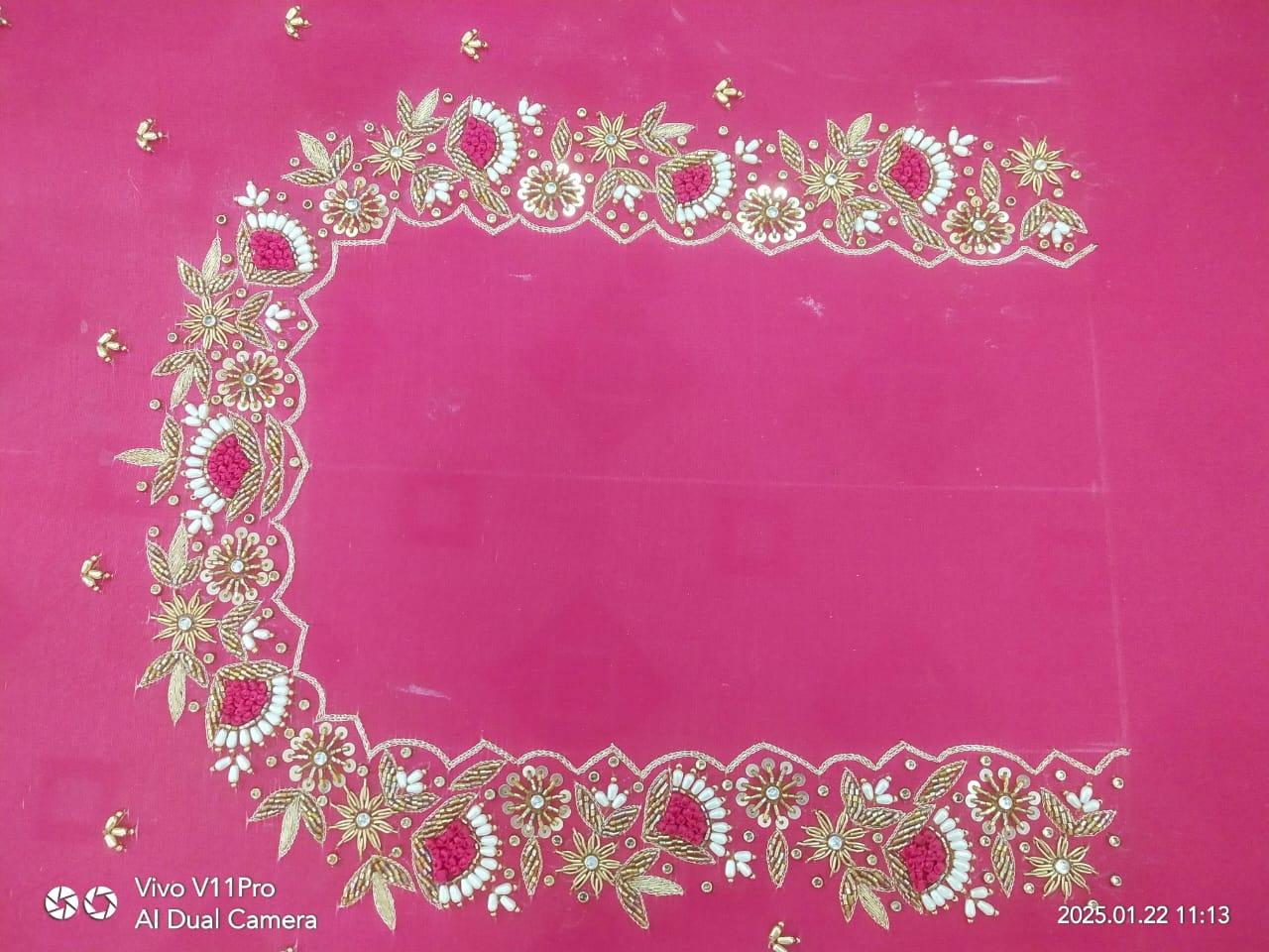 Hot pink fabric with gold zari and magenta floral embroidery border design
