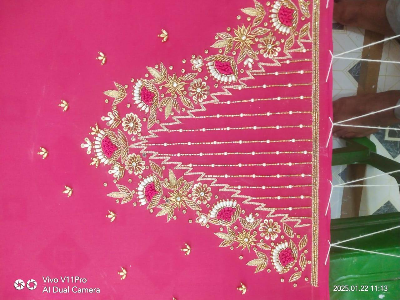 Hot pink saree with gold zari floral embroidery and pearl beadwork