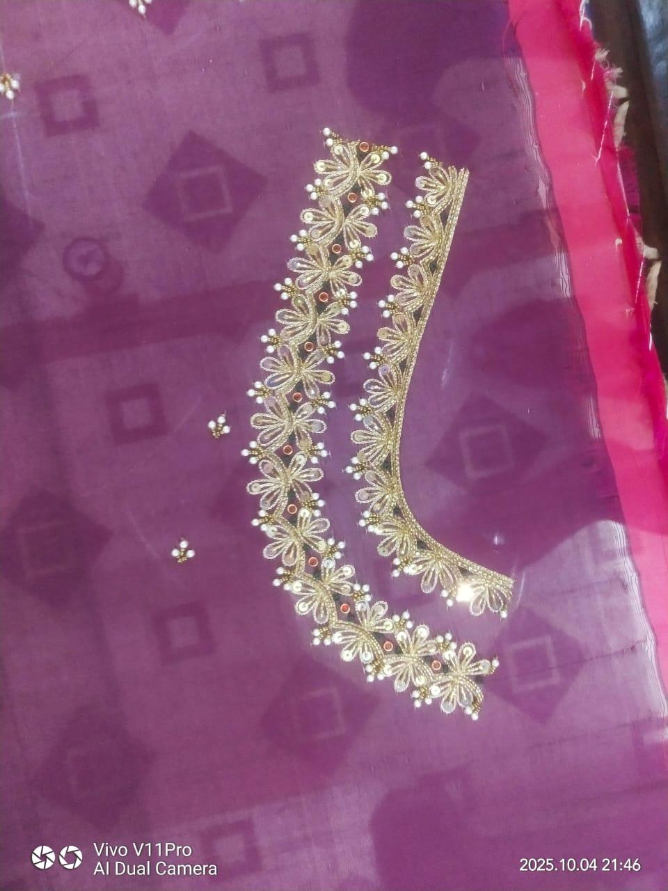 Purple blouse with intricate gold zari floral embroidery and pearl beading