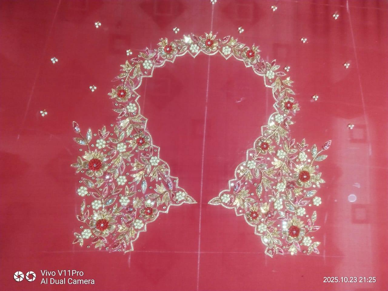 Red saree blouse with gold zari floral embroidery and red stone work