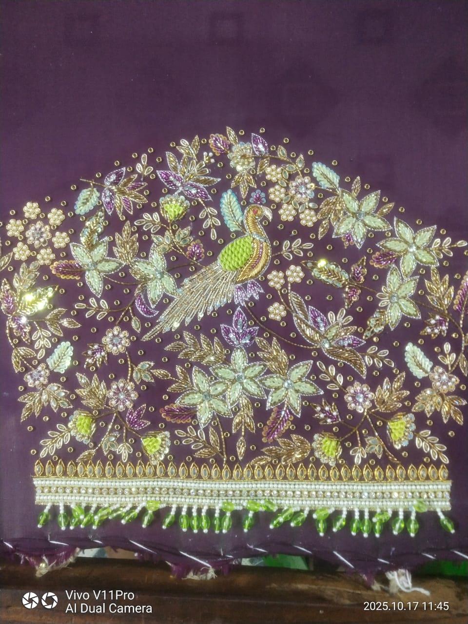 Purple saree with ornate zari and maggam work floral design