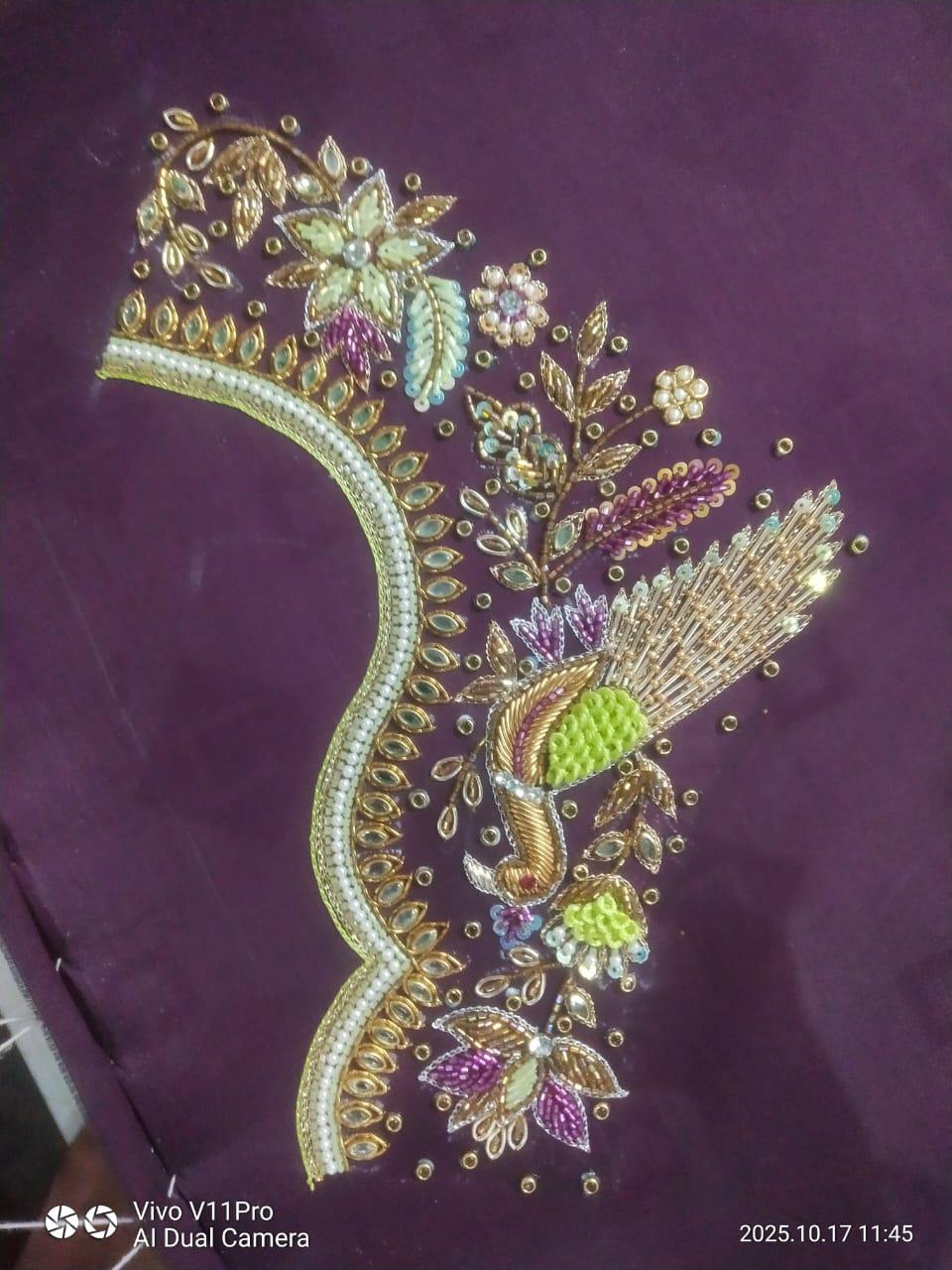 Purple fabric with ornate gold zari floral maggam work embroidery