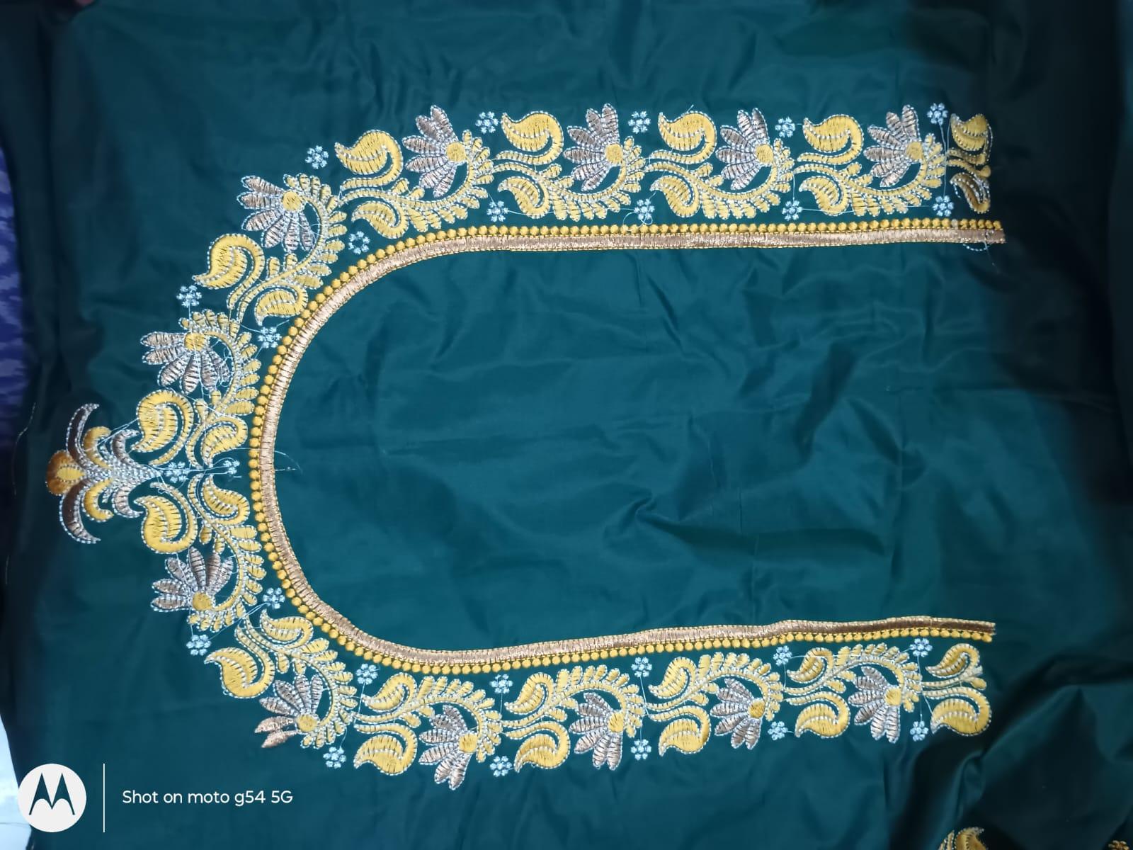 Teal silk blouse with gold and silver zari embroidery border