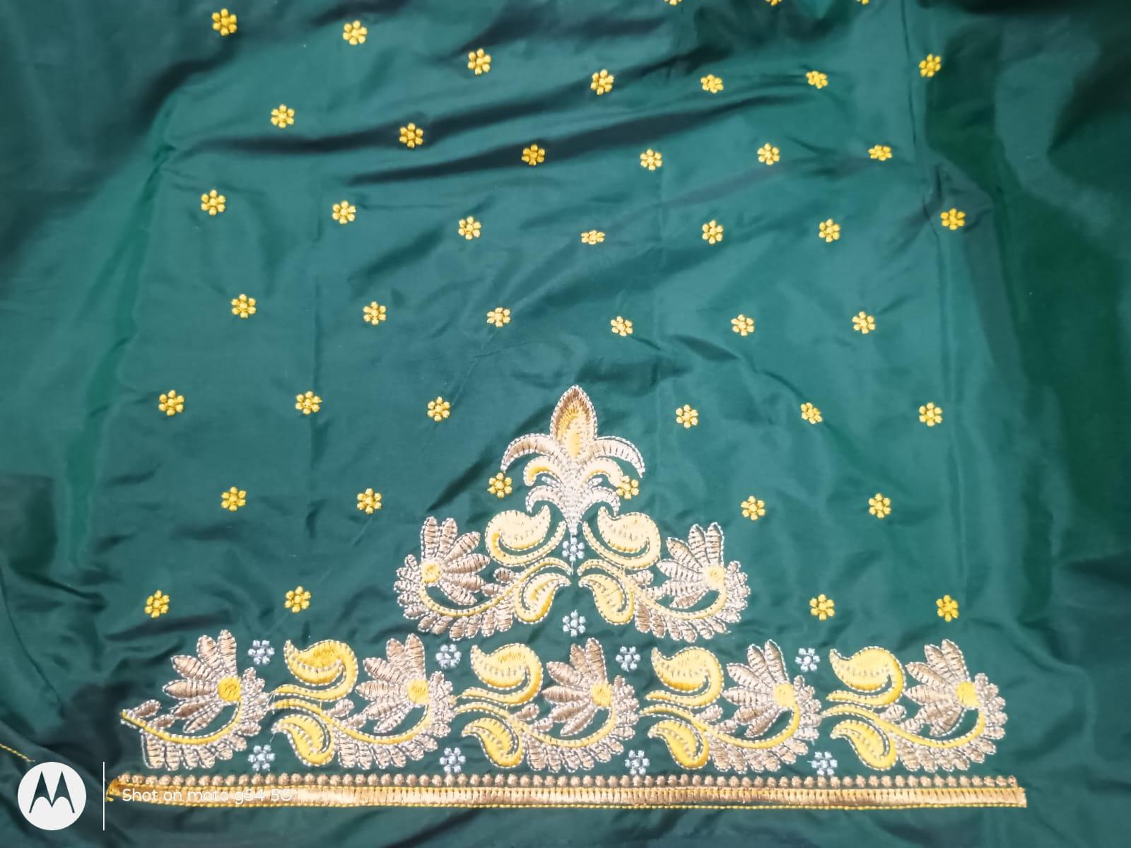 Teal silk saree with gold zari and maggam work embroidery