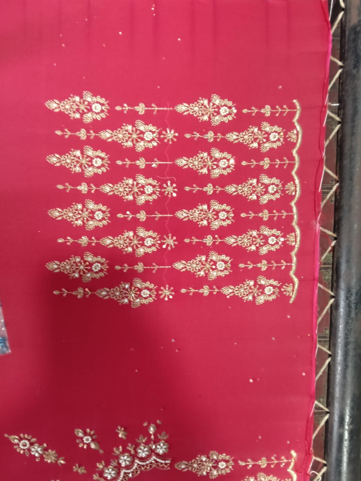Pink saree with gold zari floral embroidery and scalloped borders