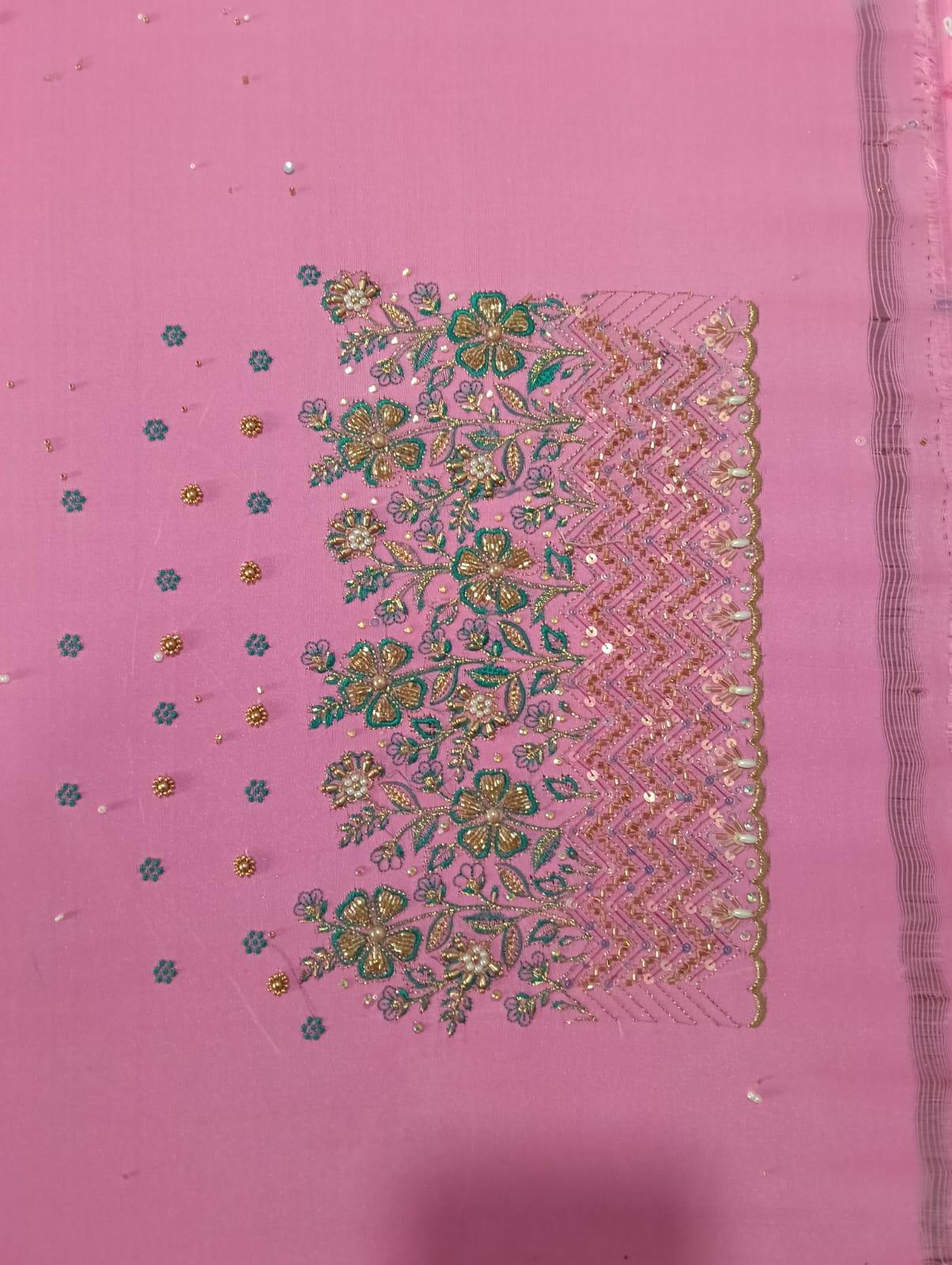 Pink saree with gold zari floral embroidery and embellished border