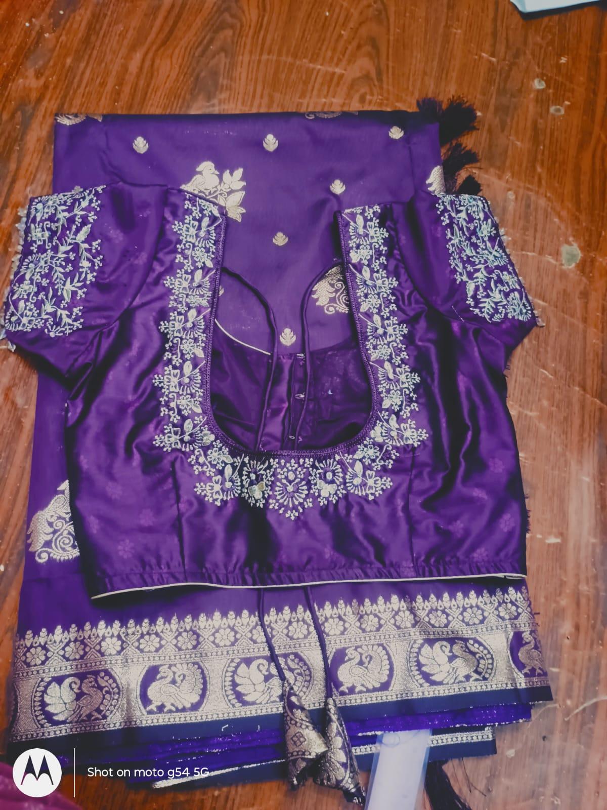 Purple silk blouse with intricate zari embroidery and floral maggam work