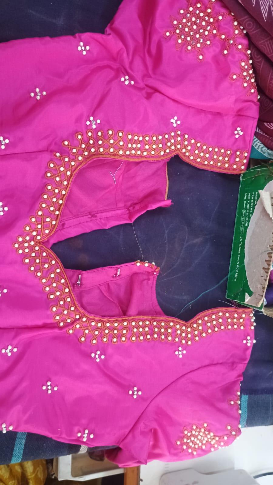 Bright pink blouse with gold pearl and stone embroidery work