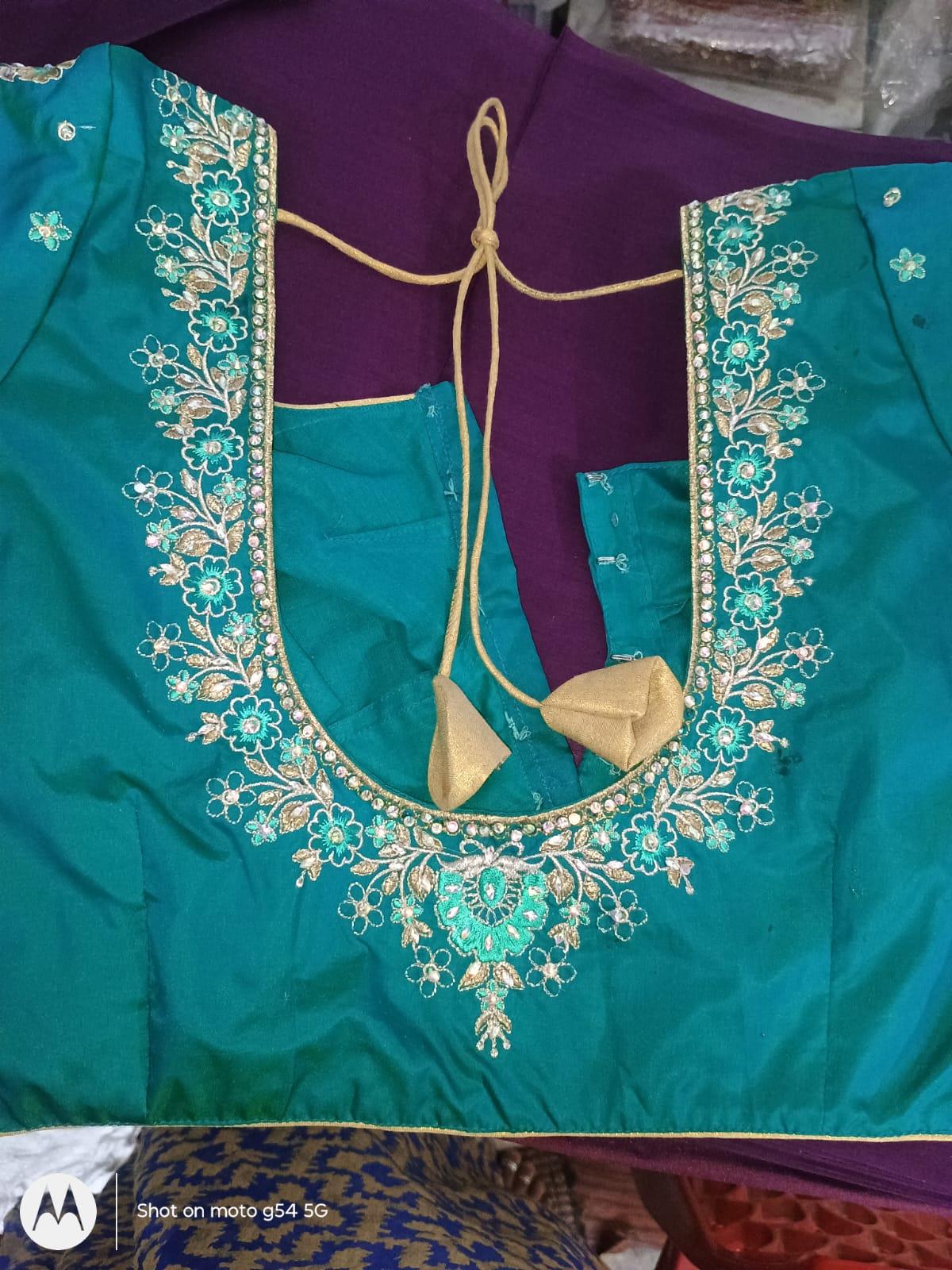 Teal maggam work blouse with gold drawstring and floral embroidery
