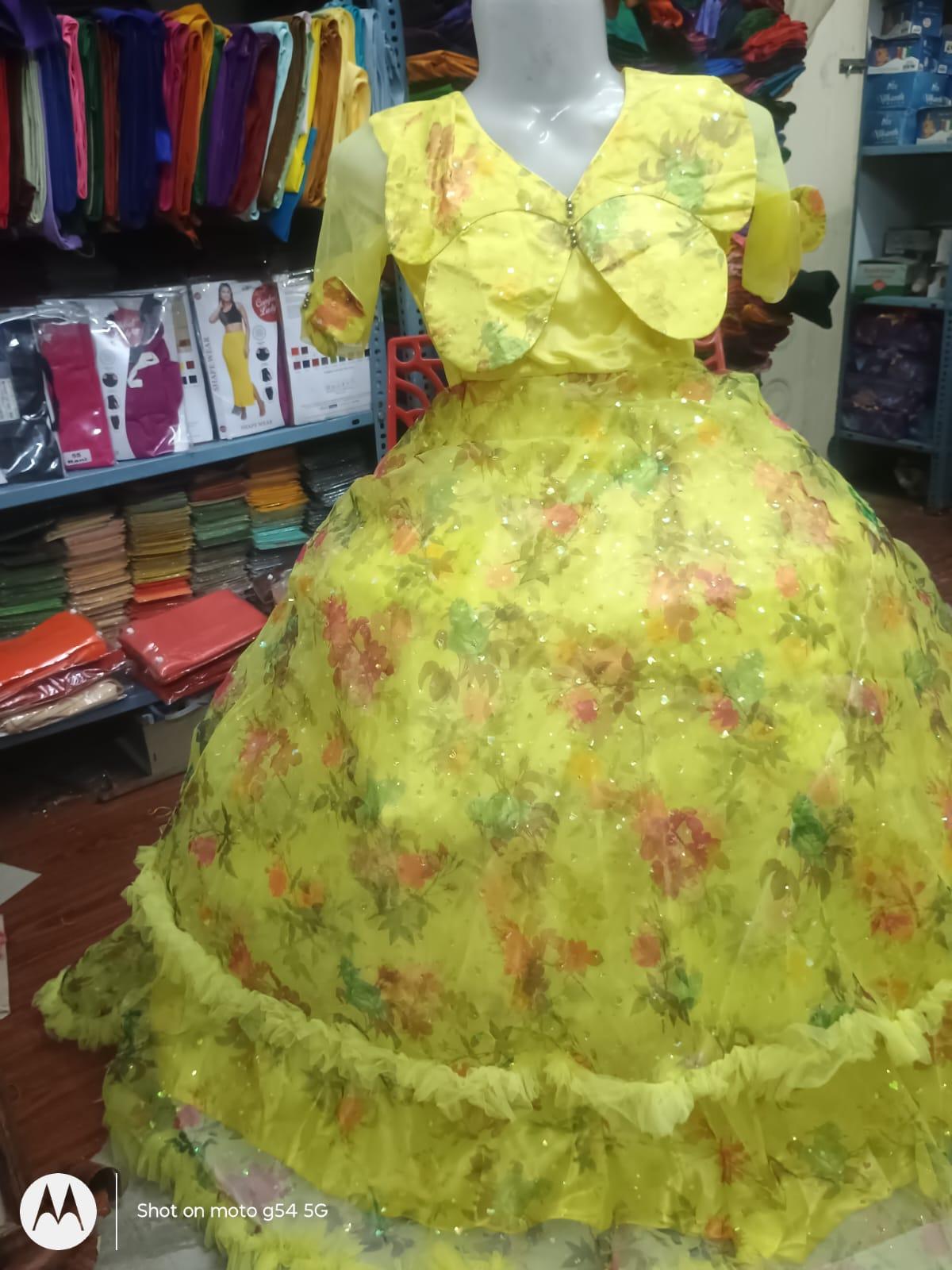 Lime yellow gown with floral embroidery and sequins work