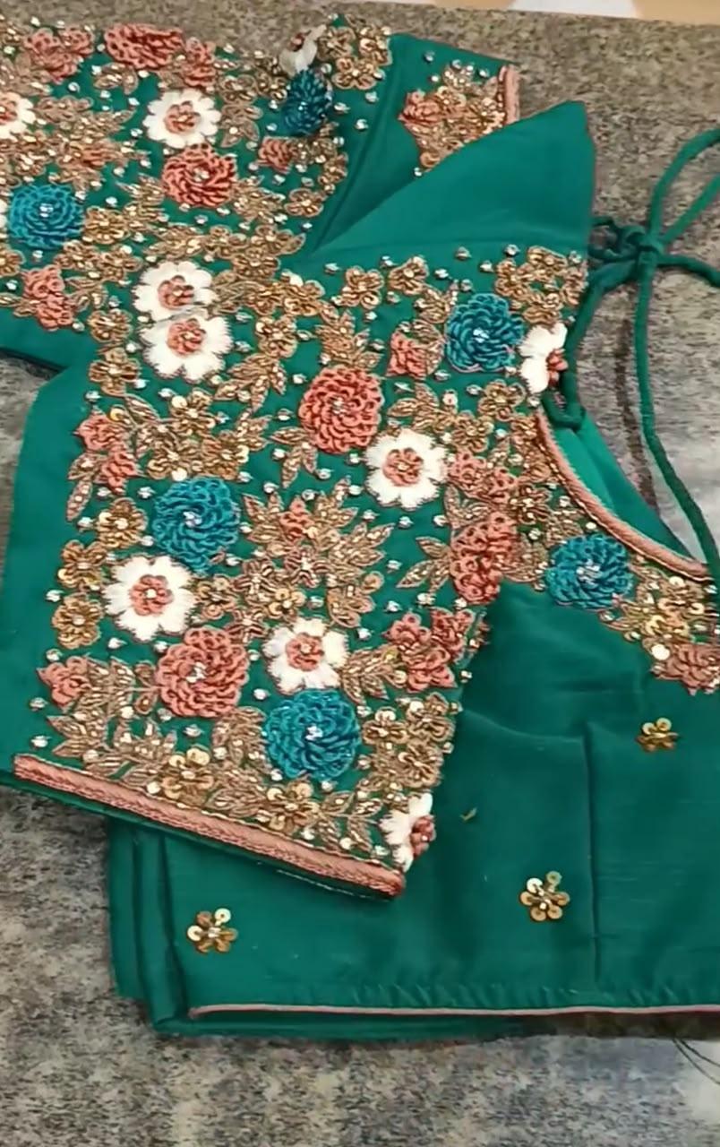 Emerald green blouse with dense floral maggam work embroidery