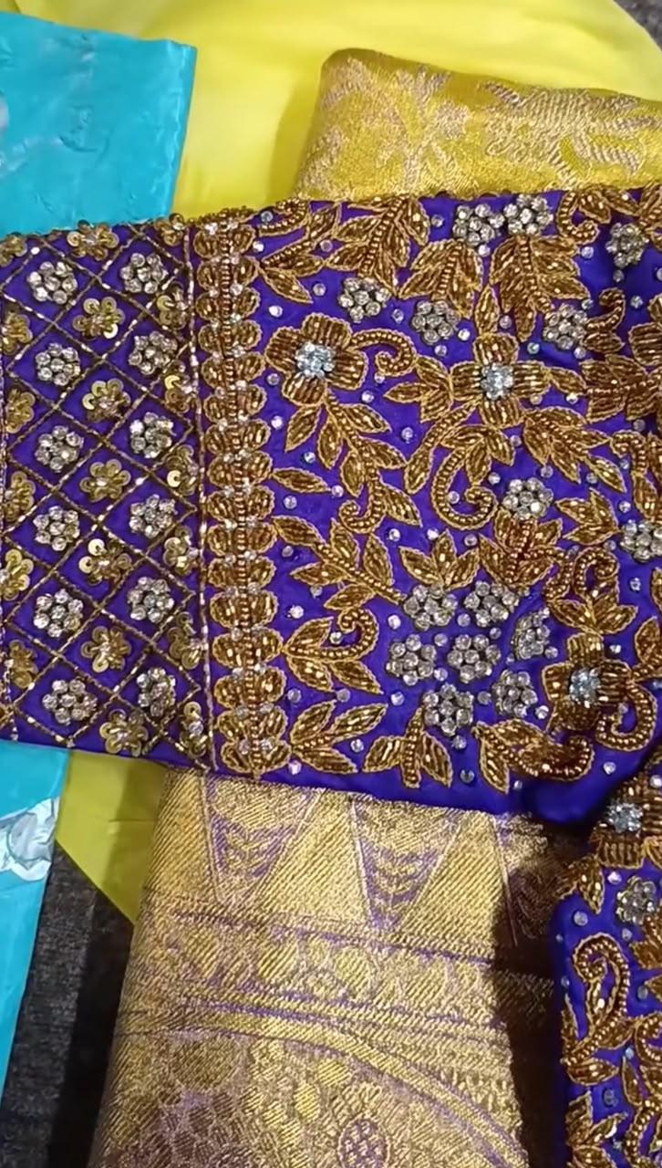Royal blue bridal blouse with gold zari floral embroidery and sequins