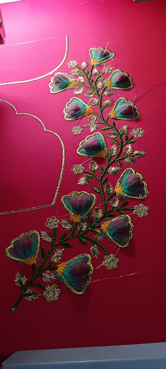 Maroon blouse with floral maggam work and gold embroidery detail