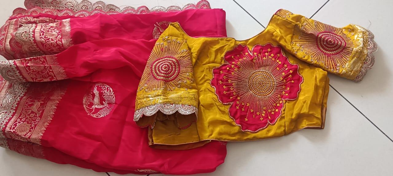 Red and gold bridal blouse with ornate floral maggam work embellishment