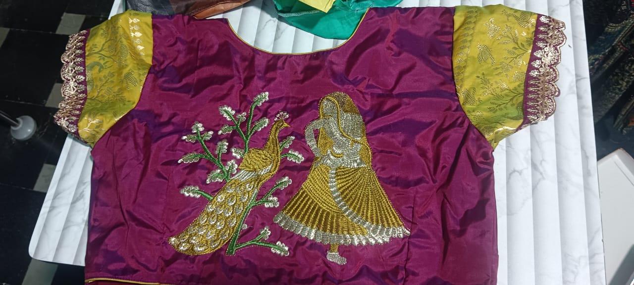 Maroon silk blouse with gold zari peacock and floral maggam work