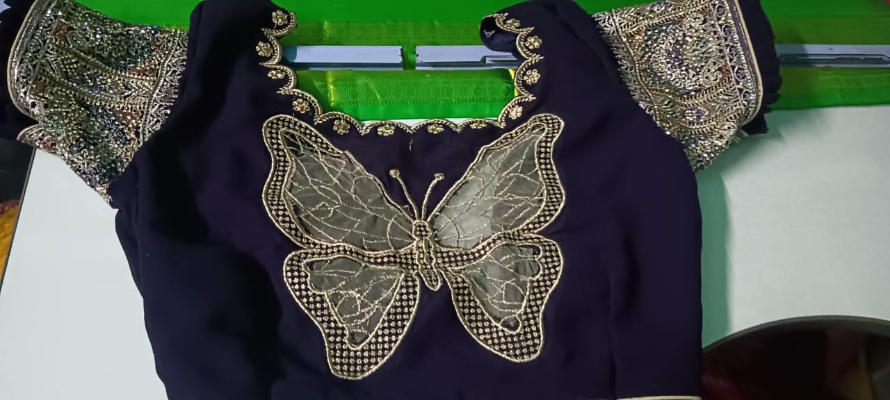 Navy blue blouse with gold zari butterfly and scalloped embroidery