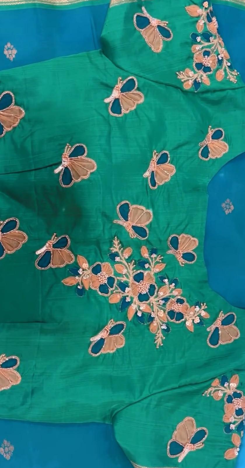 Green saree with beige butterfly and floral maggam work embroidery