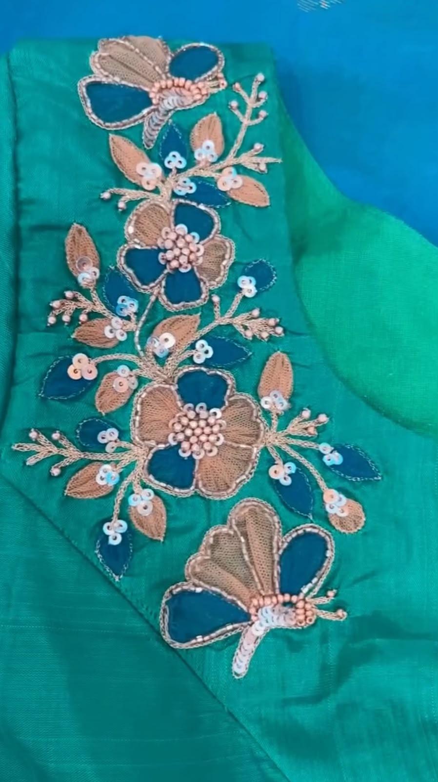 Emerald green blouse with intricate maggam work floral embroidery