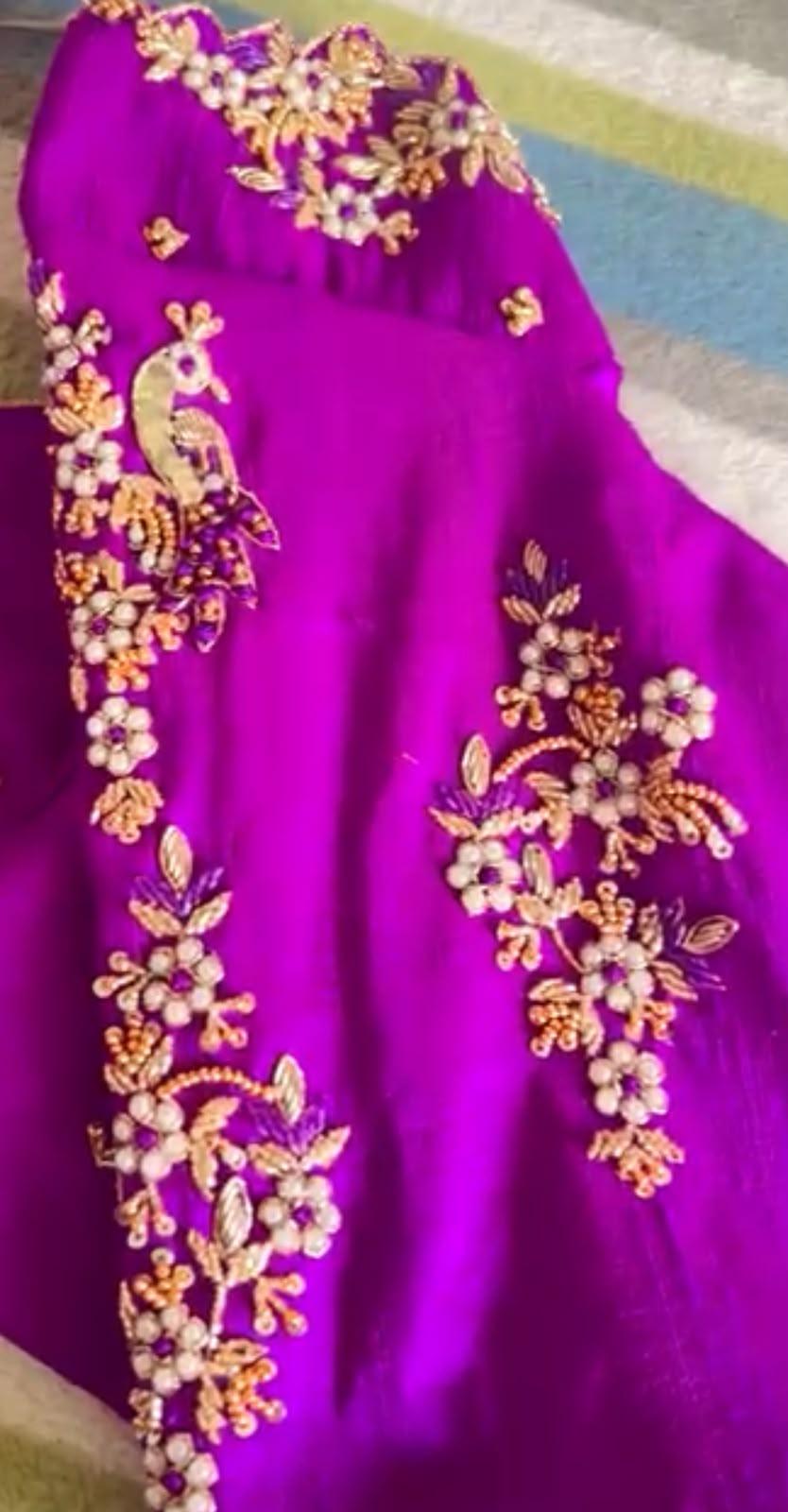 Vibrant purple saree with gold and pearl floral maggam work embroidery