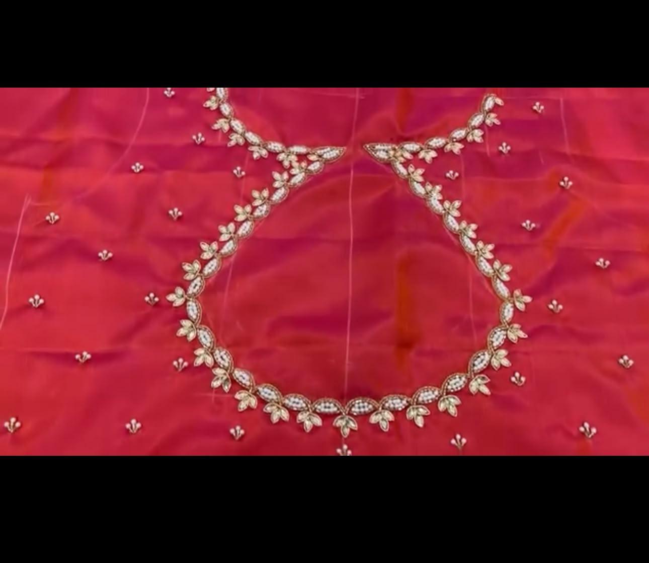 Red silk blouse with gold zari leaf embroidery neckline