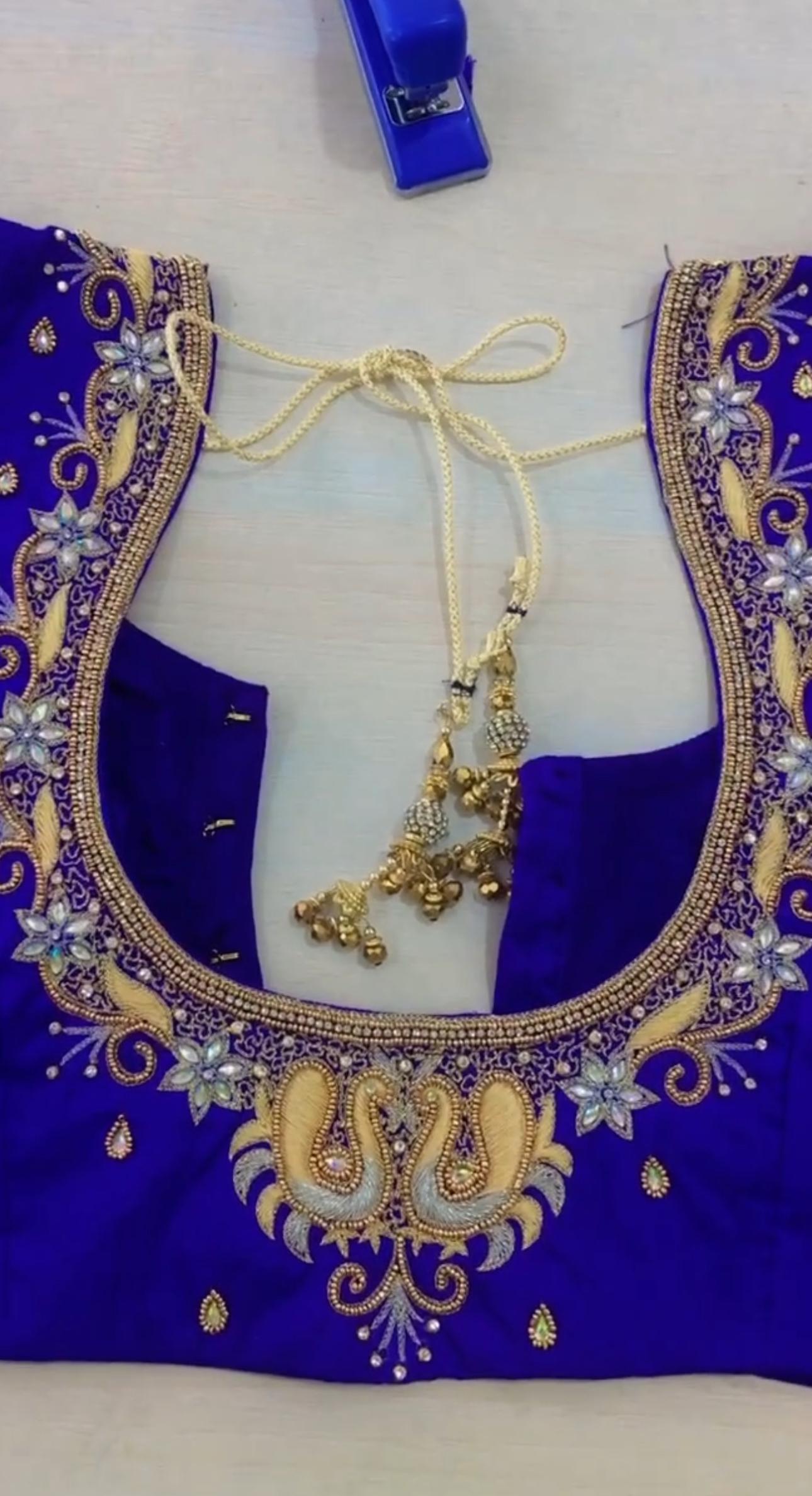 Royal blue bridal blouse with gold zari and stone maggam work
