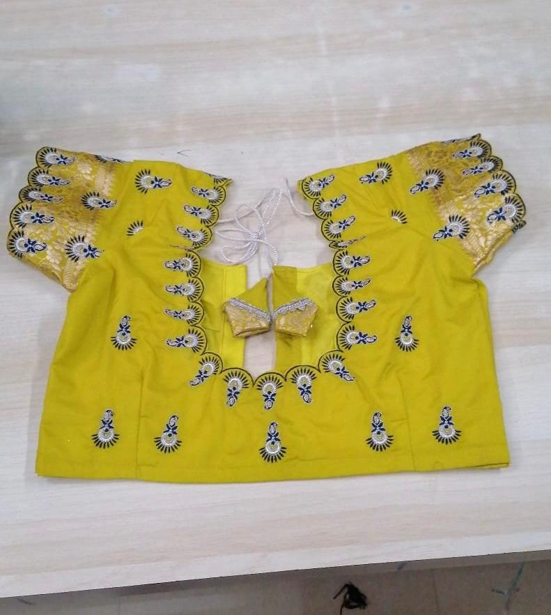 Yellow designer blouse with blue and gold maggam work embroidery
