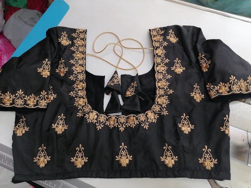 Black blouse with gold zari embroidery and floral patterns