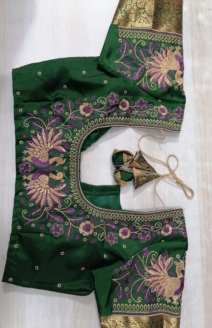 Green blouse with purple and gold floral embroidery and zari work