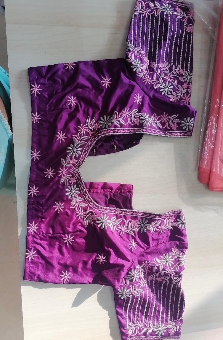 Purple velvet saree with silver floral embroidery and striped border