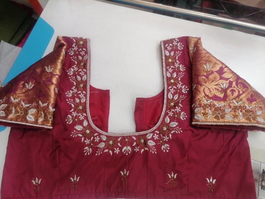 Maroon bridal blouse with gold zari embroidery and brocade sleeves